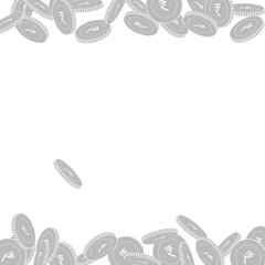 Indian rupee coins falling. Scattered black and wh
