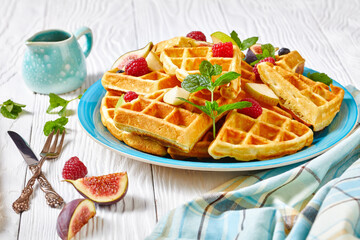 Belgian waffles with fresh berries, pears, figs