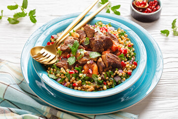 lamb stew with pearl couscous and pomegranate