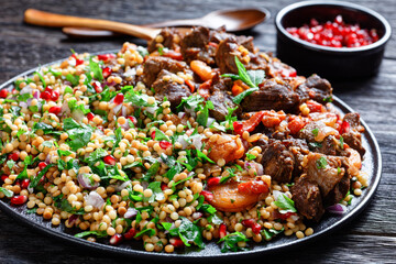 lamb stew with pearl couscous and pomegranate