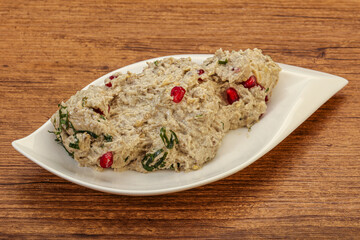 Vagan dietary cusine - mutabal with granet seeds