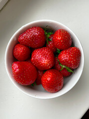 Cup of ripe red strawberries