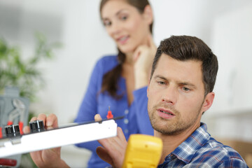 a technician fixing a kitchen