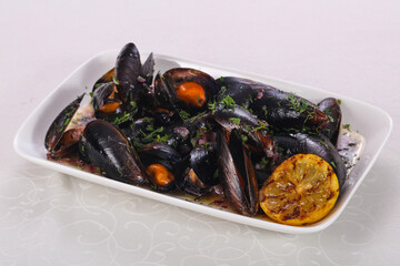 Tasty delicous boiled Mussels with herbs