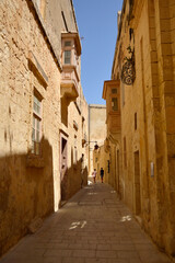 narrow stone street in Mdina old town, Malta