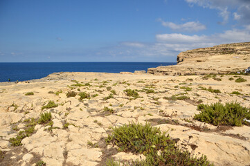 Dwejra cliffs landscape on Gozo island in bright sunny day, Malta