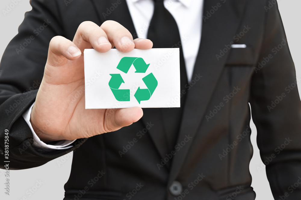 Canvas Prints save of environment concept. businessman hand holding paper card with recycle icon.
