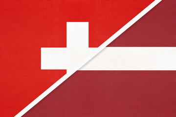 Switzerland and Latvia, symbol of national flags from textile. Championship between two countries.