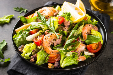 Seafood salad with leaves and vegetables.