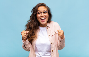  feeling shocked, excited and happy, laughing and celebrating success, saying wow!