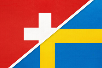Obraz premium Switzerland and Sweden, symbol of national flags from textile. Championship between two countries.