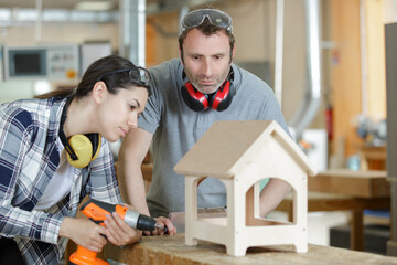 a student in woodworking workshop