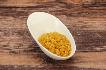 Vegetarian cuisine - dry bulgur for cooking