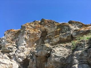 Rock against blue sky, summer
