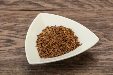 Dry zeera seeds in the bowl