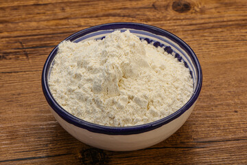 Wheat flour heap in the bowl