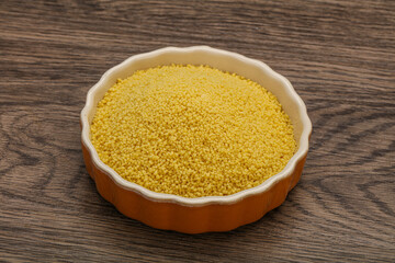 Raw cous cous heap in the bowl
