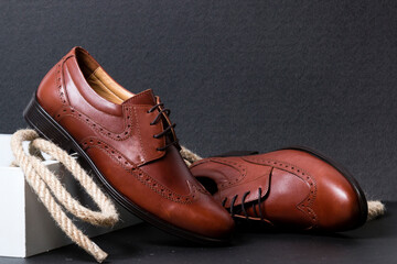 Creative shot of brown men's fashion leather shoes