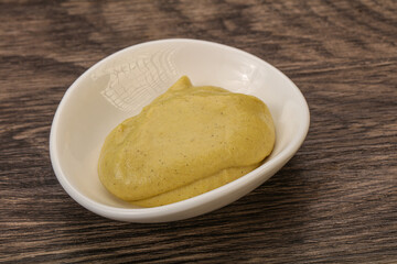 Dijon mustard sauce in the bowl