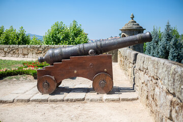 Fototapeta na wymiar View of old wooden-based cannon in the fortress of Castelo de Chaves