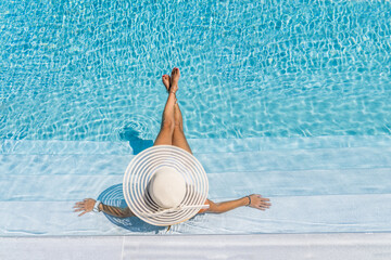 woman in luxury spa resort near the swimming pool. - 381883851