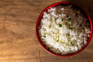 Cooked rice In the red ceramics bowl