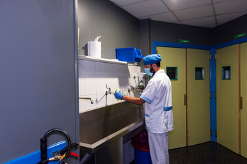 cleaning staff performing disinfection and hygiene work in hospital facilities