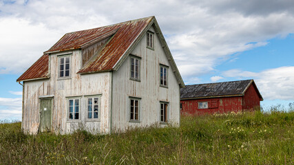Fototapeta na wymiar Old abandoned houses in Norway.