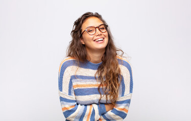  looking like a happy, proud and satisfied achiever smiling with arms crossed
