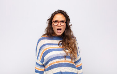  feeling terrified and shocked, with mouth wide open in surprise