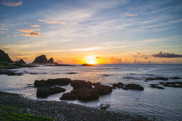 Fototapeta na wymiar Sunrise at Dongqing Bay in Lanyu, Taitung, Taiwan