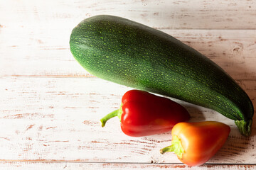 fresh vegetables on white wooden boards