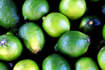 Heap of fresh limes - background
