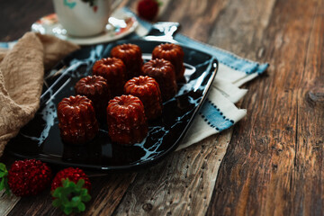 Canele is a small French pastry with rum and vanilla