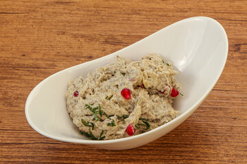 Vagan dietary cusine - mutabal with granet seeds