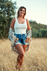 Beautiful girl posing on the countryside