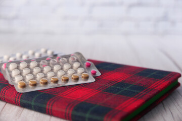 birth control pills on white background, Top view 