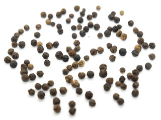 Black pepper background, herbs, spices in top view.