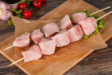 Raw pork meat skewer for grill