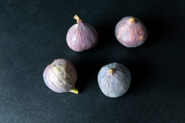 fresh figs on black shiny background
