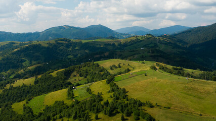 Fototapeta na wymiar Beautiful green mountain landscape with trees on it
