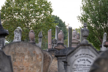 Fototapeta premium Gravestones at the historic Victorian Jewish cemetery in Willesden, north west London, UK