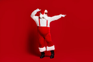 Full length body size view of his he attractive cool funny comic fat white-haired Santa mc artist...