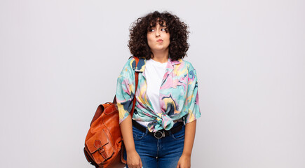  looking puzzled and confused, wondering or trying to solve a problem or thinking