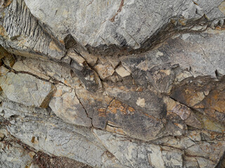 Stone texture tile. Ginger stone for background. Pieces of stone.