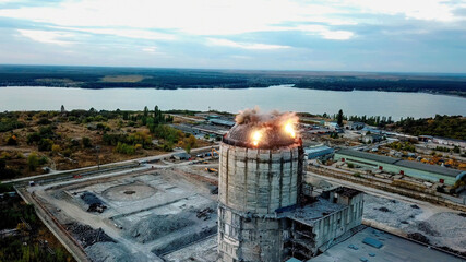 Demolition of old industrial building by exploding dynamite, aerial view © Mulderphoto