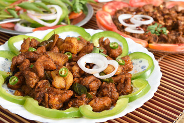 Spicy hot meat curry from Kerala India. beef buffalo pork pig lamb masala curry vindaloo. Indian food served rice, appam popular Lankan, Thailand, Malaysia, Asian. Indian spices, goulash, fry