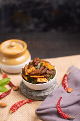 Spicy hot meat curry from Kerala India. beef buffalo pork pig lamb masala curry vindaloo. Indian food served rice, appam popular Lankan, Thailand, Malaysia, Asian. Indian spices, goulash, fry