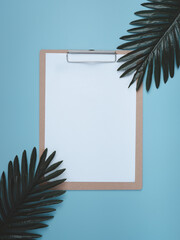 Blank clipboard on pastel background. Office concept.