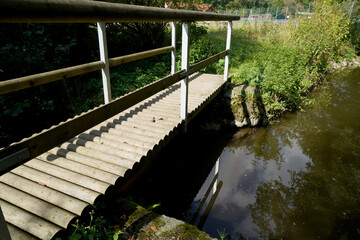 wooden bridge over the river